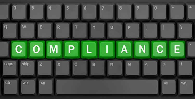 PC-Tastatur mit dem Wort: Compliance